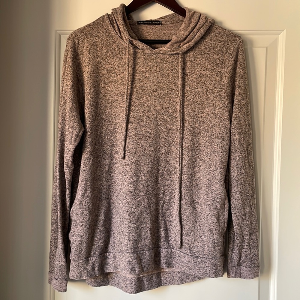 Pink and black sweater. Worn in but still comfy.